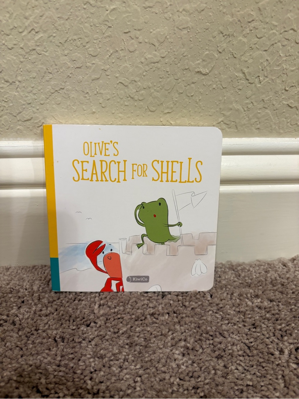 Olive's Search For Shells Board Book - Yellow, White, Green, Red